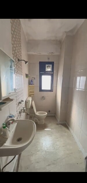 Bathroom in 3 BHK Builder Floor at Mahavir Enclave – for Sale