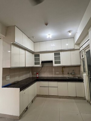 Kitchen in 2 BHK Apartment at Panchsheel Greens, Sector 16 Greater Noida – for Rent