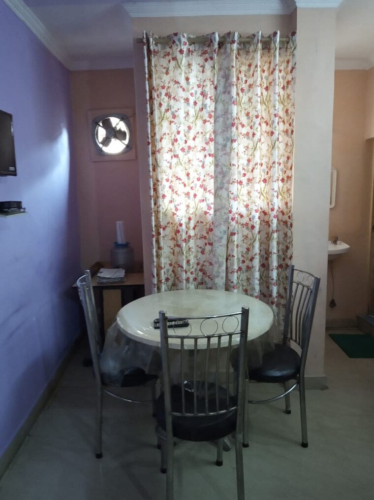 Living Room, rwa-apartments-sector-12 1.5 Bedroom 650 Sq.Ft. Builder Floor In Sector 12 Noida 9712867