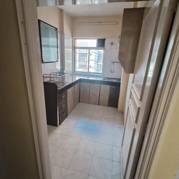 Kitchen in 1 BHK Apartment at Dheeraj Kirti, Malad West – for Rent
