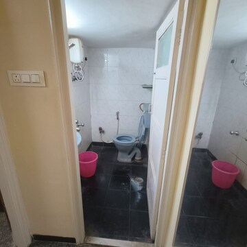 Bathroom in 1 BHK Apartment at Dheeraj Kirti, Malad West – for Rent