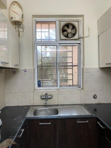 Kitchen in 3 BHK Builder Floor at Ansal API Esencia, Sector 67 – for Rent