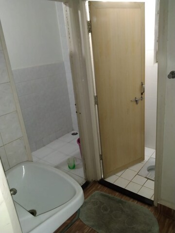 Bathroom in 1 BHK Apartment at Guru Ganesh Nagar Society, Kothrud – for Rent