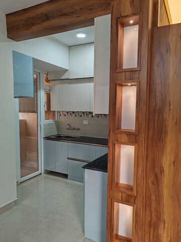 Kitchen in 2 BHK Apartment at Signature Orchard Avenue 2, Sector 93 – for Rent