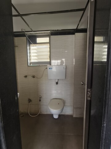 Bathroom in 1 BHK Apartment at Rosa Classique, Kasarvadavali – for Rent