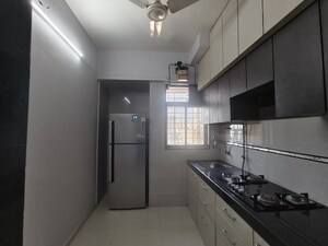 Kitchen in 1 BHK Apartment at Rosa Classique, Kasarvadavali – for Rent