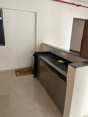 Kitchen in 1 BHK Apartment at Raunak Residency Thane, Pokhran Road No One – for Rent