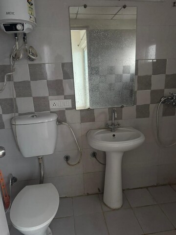 Bathroom in 2 BHK Apartment at Gaur Yamuna City 16th Park View, Gaur Yamuna City – for Rent