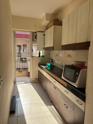 Kitchen in 2 BHK Apartment at Windlass River Valley, Harrawala – for Rent