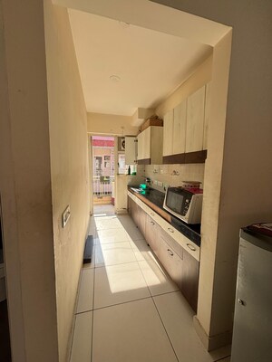 Kitchen in 2 BHK Apartment at Windlass River Valley, Harrawala – for Rent