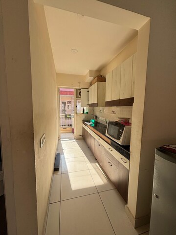 Kitchen in 2 BHK Apartment at Windlass River Valley, Harrawala – for Rent