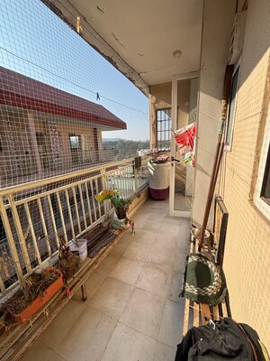 Balcony in 2 BHK Apartment at Windlass River Valley, Harrawala – for Rent