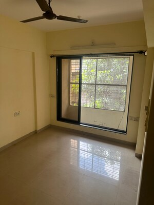 Room in 2 BHK Apartment at Suraksha Apartment, Andheri West – for Rent