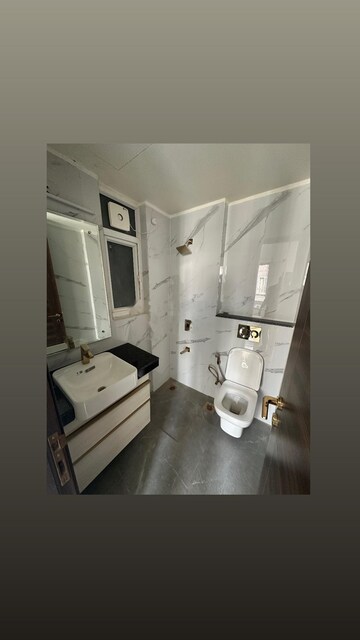 Bathroom in 3 BHK Apartment at Smart World Orchard, Sector 61 – for Rent