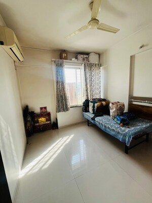 Bedroom in 2 BHK Apartment at Karan Suncoast, Bavdhan – for Rent