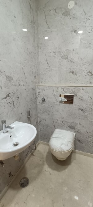 Bathroom in 3 BHK Builder Floor at Rohini Sector 8 – for Sale