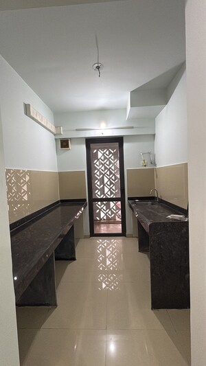 Kitchen in 2 BHK Apartment at Lodha Lakeshore Greens, Hedutane – for Sale