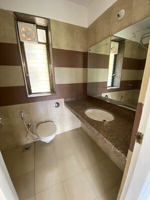 Bathroom in 2 BHK Apartment at Himbindu CHS, Goregaon West – for Sale