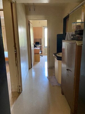 Kitchen in 3 BHK Apartment at Kumar Mahatma Society, Kothrud – for Rent