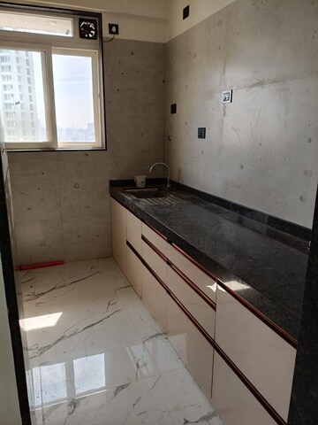 Kitchen in 3 BHK Apartment at H Rishabraj Phoenix, Borivali West – for Rent