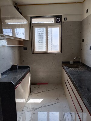 Kitchen in 3 BHK Apartment at H Rishabraj Phoenix, Borivali West – for Rent