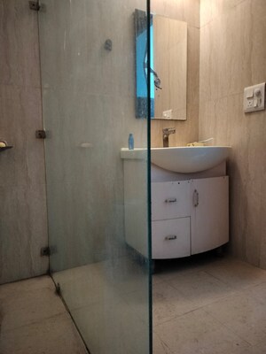 Bathroom in 4 BHK Builder Floor at Jasola Vihar – for Rent
