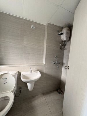 Bathroom in 3 BHK Apartment at Runwal Gardens Phase 2, Dombivli East – for Sale