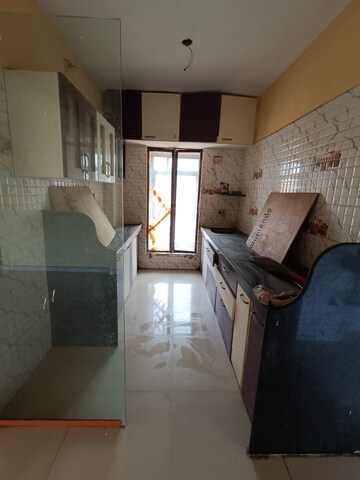 Kitchen in 1 BHK Apartment at Aakash Ganga CHS, Nalasopara West – for Rent