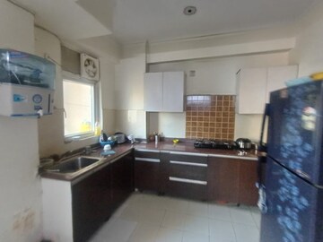 Kitchen in 3 BHK Apartment at Amrapali Zodiac, Sector 120 – for Sale