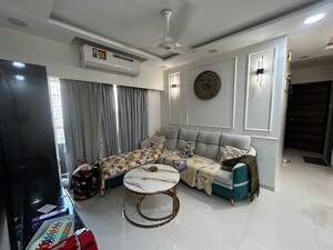 Living Room in 1 BHK Apartment at KM Horizon Flora, Ghodbunder Road – for Sale