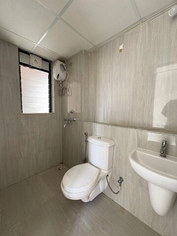 Bathroom in 2 BHK Apartment at Runwal Gardens Phase 2, Dombivli East – for Sale