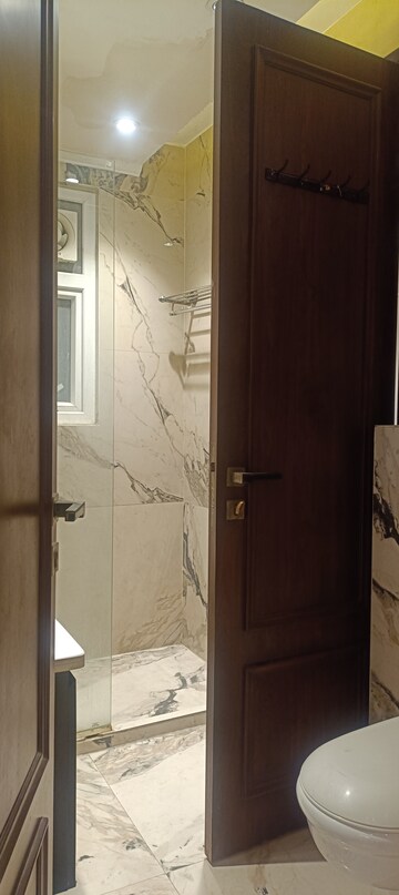 Bathroom in 3 BHK Builder Floor at Surajmal Vihar – for Sale