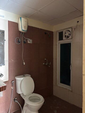 Bathroom in 3 BHK Apartment at Mahagun Moderne, Sector 78 – for Rent