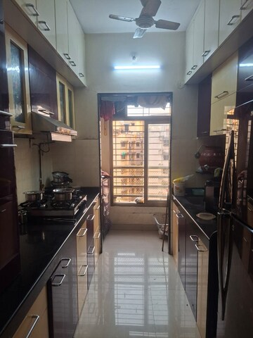 Kitchen in 2 BHK Apartment at Hubtown Greenwoods, Vartak Nagar – for Sale