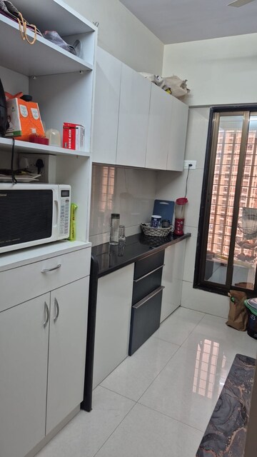 Kitchen in 2 BHK Apartment at Unique Greens Ghodbunder Road, Ghodbunder Road – for Rent