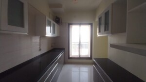 Kitchen in 2 BHK Apartment at Hiranandani Evergreen, Ghodbunder Road – for Rent