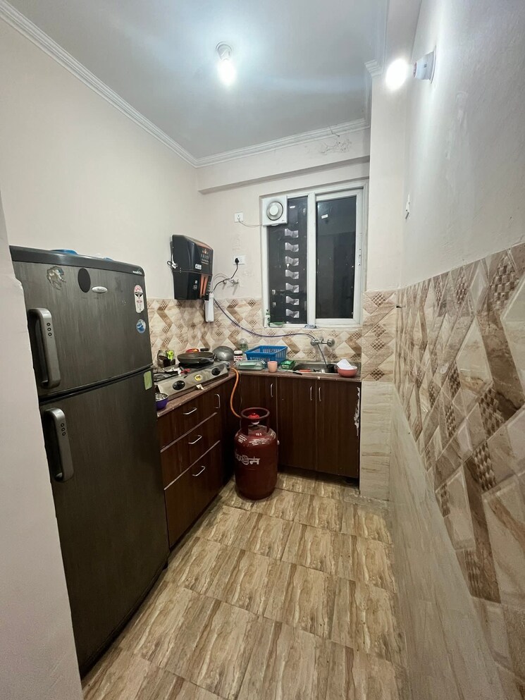 Kitchen, aims-golf-city 2.5 Bedroom 1035 Sq.Ft. Apartment In Sector 75 Noida 9714553