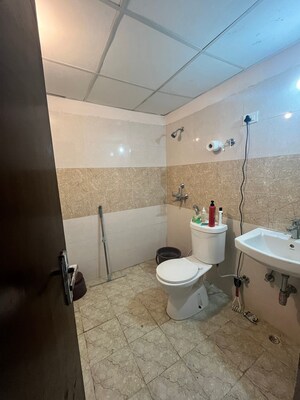 Master Bedroom in 2.5 BHK Apartment at Aims Golf City, Sector 75 – for Rent