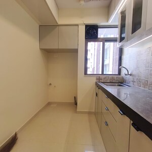 Kitchen in 2 BHK Apartment at Squarefeet Green Square, Parkwoods – for Rent