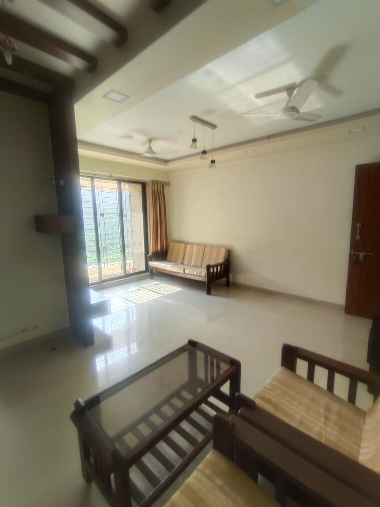 Living Room, raunak-unnathi-woods-phase-7-a-and-b 1 Bedroom 400 Sq.Ft. Apartment In Ghodbunder Road Thane 9714662