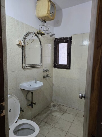 Bathroom in 3 BHK Apartment at Dwarka – for Rent