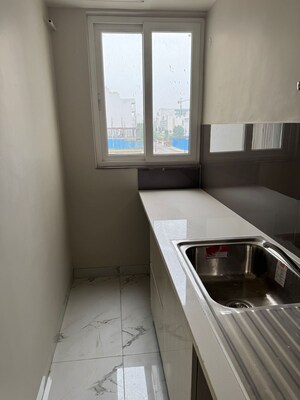 Kitchen in 2.5 BHK Independent House at Central Park Cerise Suites, Sohna Sector 33 – for Sale