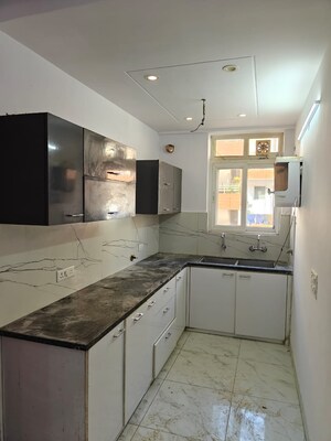 Kitchen in 3 BHK Builder Floor at Dhakoli – for Sale