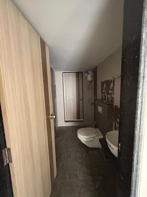 Bathroom in 2 BHK Apartment at Shri Satguru Garden, Kavesar – for Rent