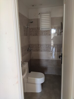 Bathroom in 2 BHK Apartment at Windlass River Valley, Harrawala – for Rent