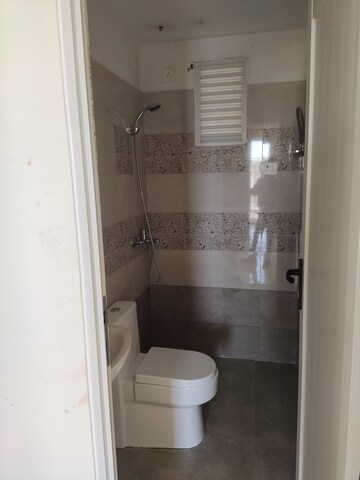 Bathroom in 2 BHK Apartment at Windlass River Valley, Harrawala – for Rent