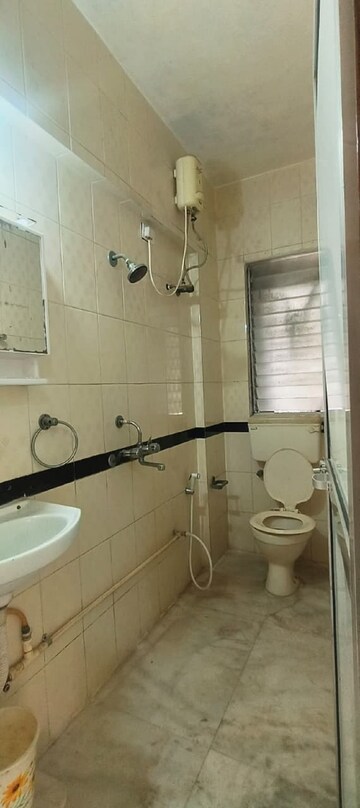 Bathroom in 1 BHK Apartment at Khar West – for Rent