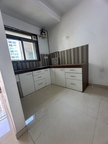 Kitchen in 2 BHK Apartment at Runwal Eirene, Balkum Pada – for Rent