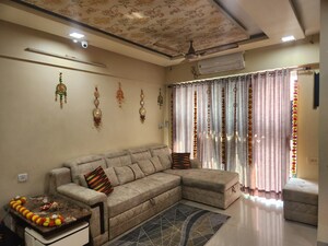 Living Room in 2 BHK Apartment at Tharwani Rosewood Heights, Kharghar Sector 10 – for Rent