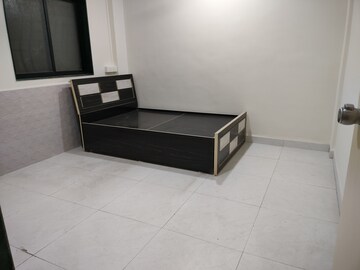 Bedroom in 2 BHK Apartment at Wadgaon Sheri – for Rent